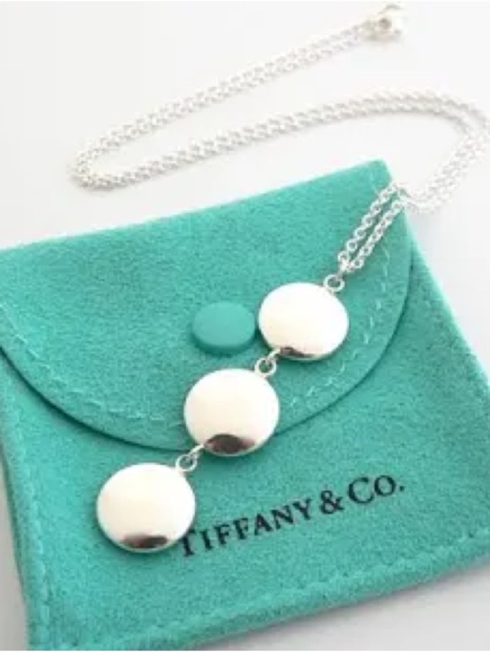 Tiffany & Co. three disc pendant necklace comes with pouch